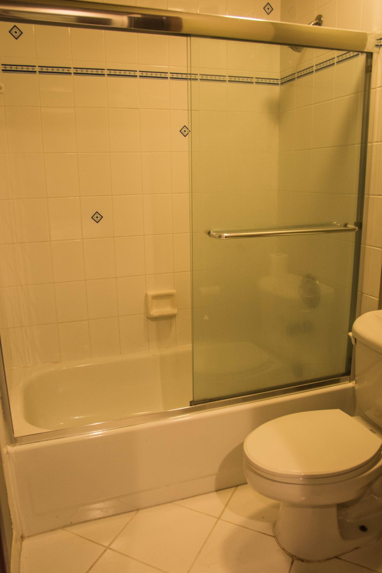17234 Ventana Drive Boca Raton, FL 33487 - Photo 25 of 27 a bathroom with a toilet and a shower