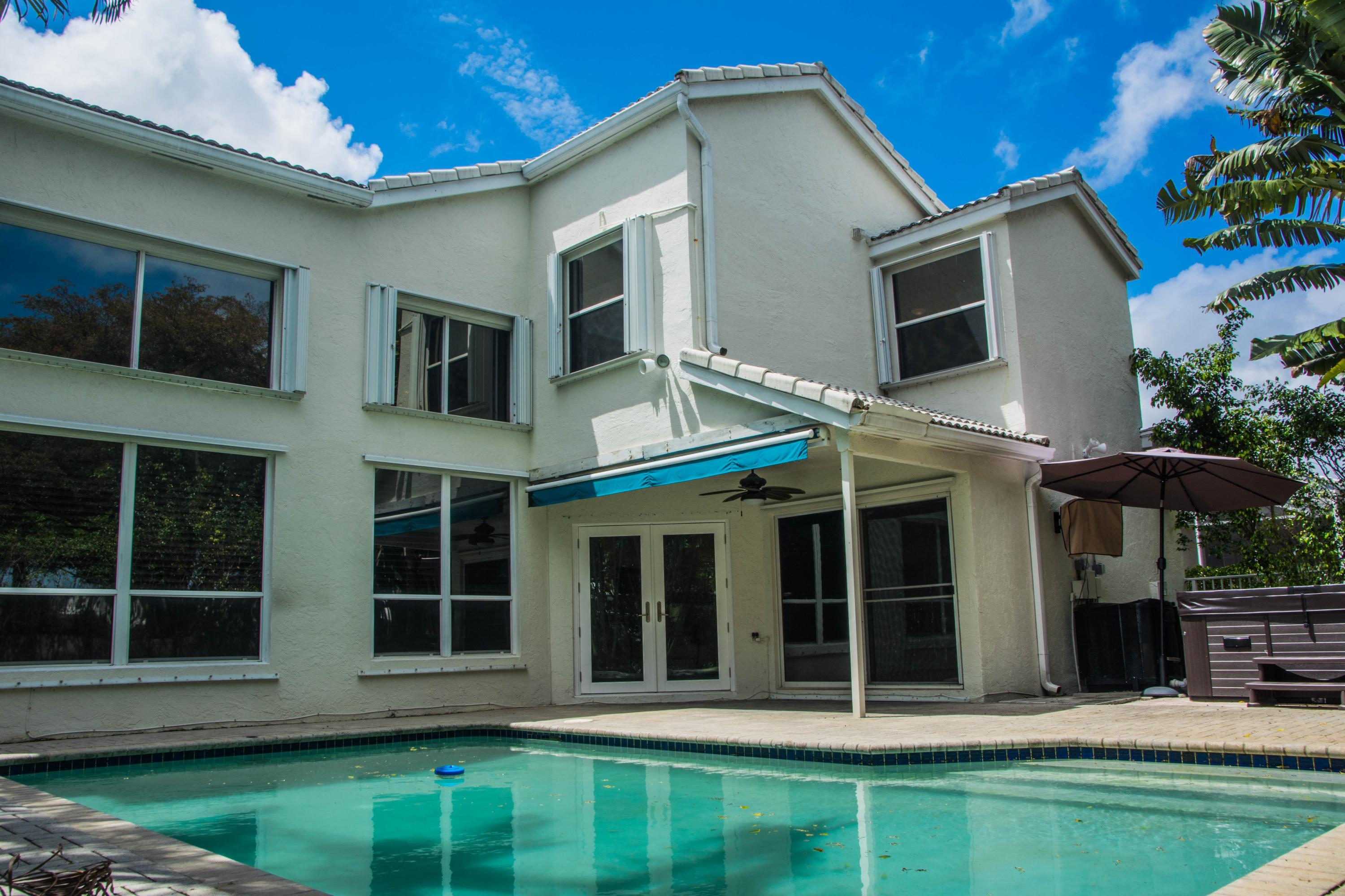 17234 Ventana Drive Boca Raton, FL 33487 - Photo 27 of 27 a house view with a garden space
