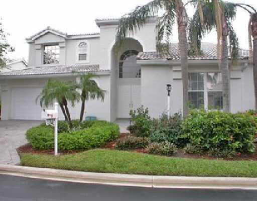 17234 Ventana Drive Boca Raton, FL 33487 - Photo 3 of 27 a front view of a house with a garden