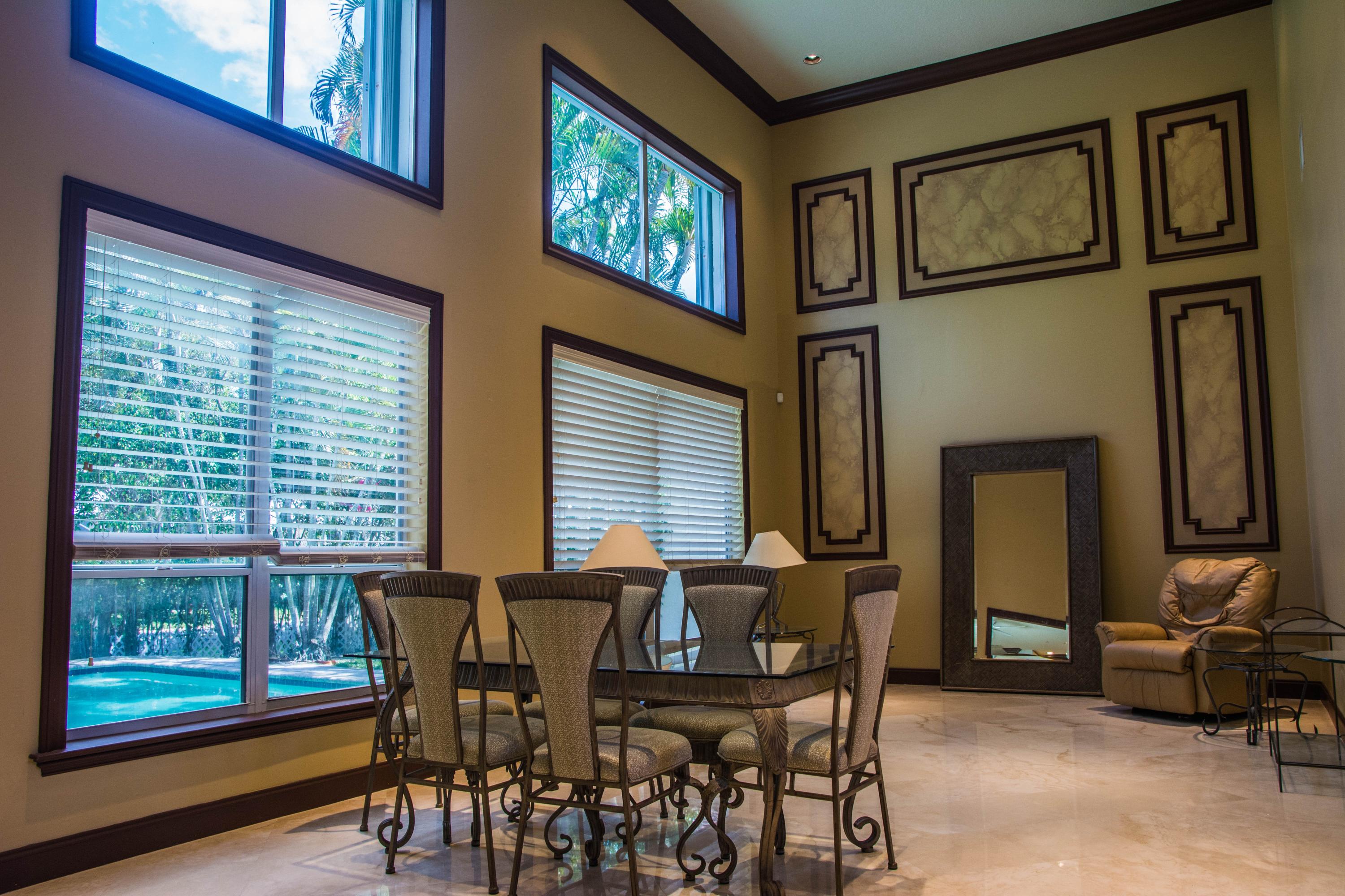 17234 Ventana Drive Boca Raton, FL 33487 - Photo 6 of 27 a view of a dining room with furniture window and outside view