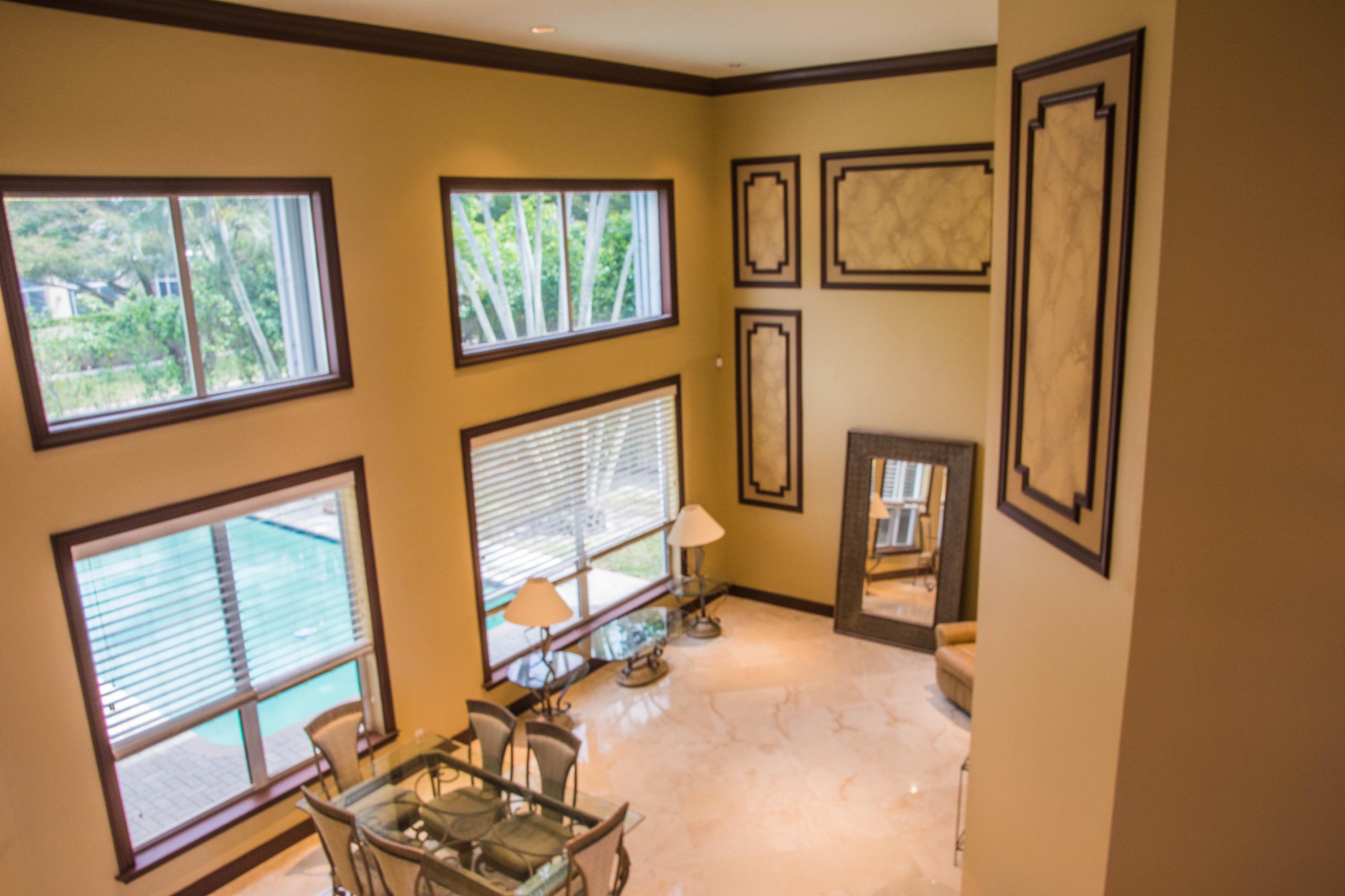 17234 Ventana Drive Boca Raton, FL 33487 - Photo 7 of 27 a view of an entryway with wooden floor