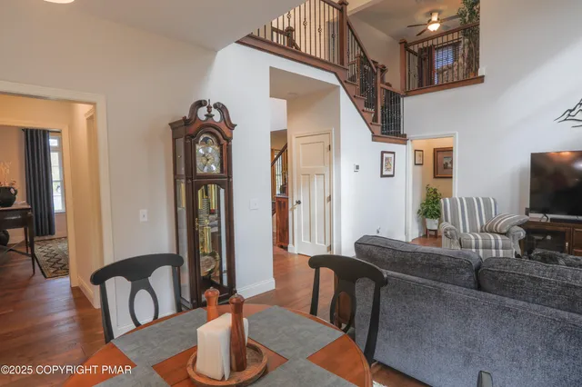 a bathroom with a sink mirror vanity and toilet