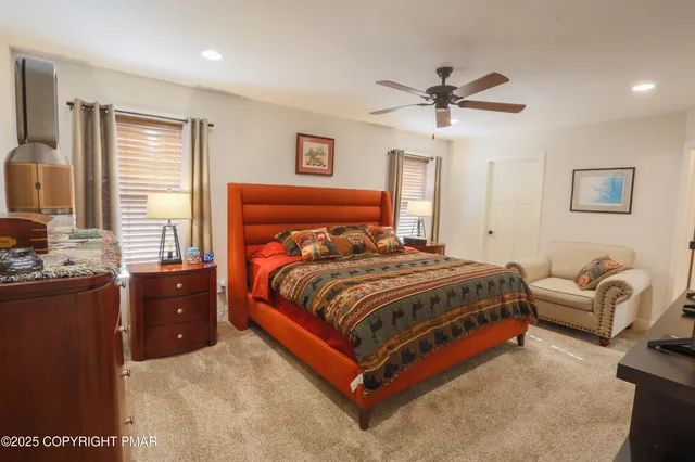 a bathroom with a tub and a shower