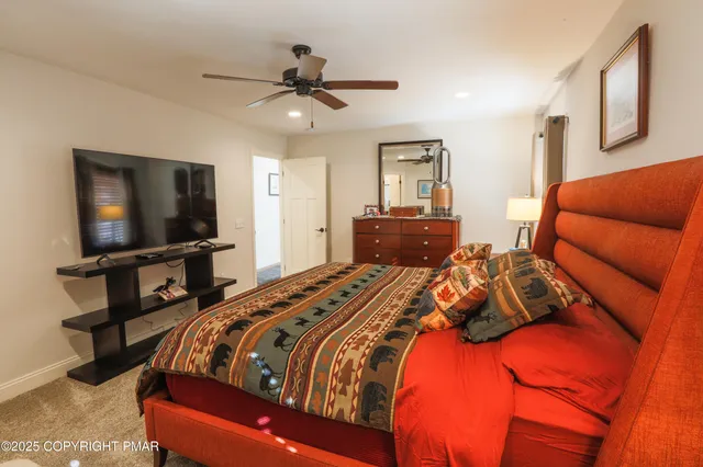 a bathroom with a sink vanity and mirror