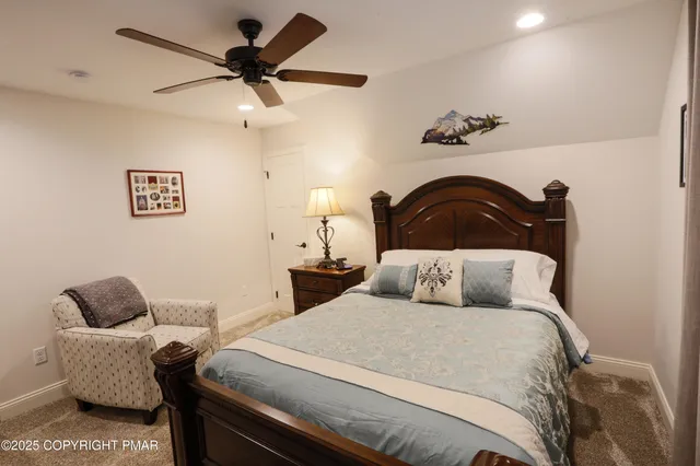 a bathroom with a shower and a toilet