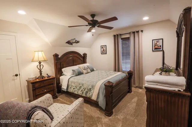 a living room with furniture a dining table and kitchen view