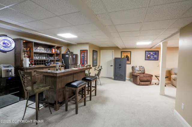 a living room with furniture and a couch