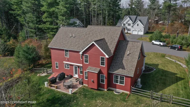 a view of a dinning table and chairs in the patio