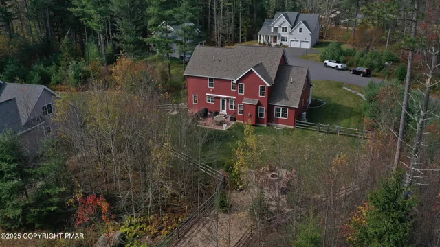 a view of a patio with a table and chairs