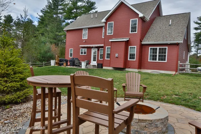 a view of a backyard with trees