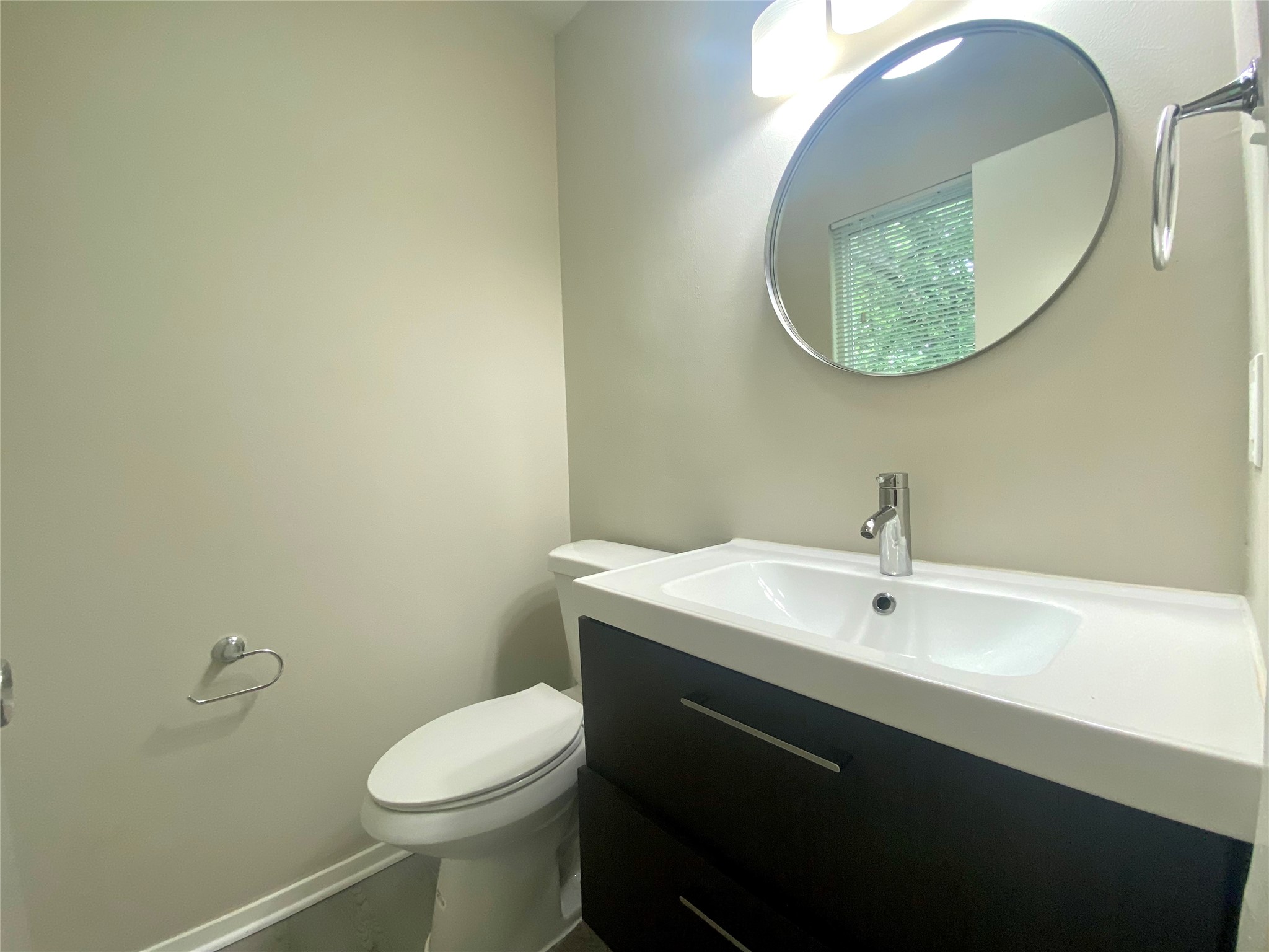 6400 Brookside Drive Austin, TX 78723 - Photo 15 of 26 Bathroom with vanity and toilet