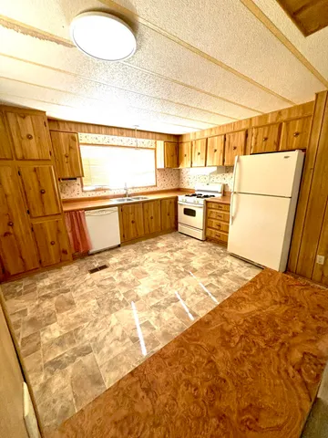 a view of livingroom with furniture and window