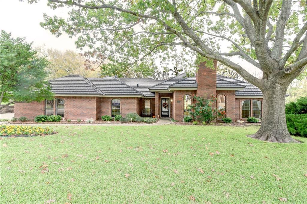 8708 Canyon Crest Road Fort Worth, TX 76179 - Photo 1 of 1 front view of a house and a yard