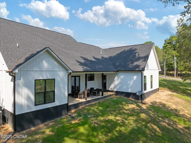 a view of a back yard of the house