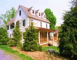 35 Fairfield Road Greenwich, CT 06830 - Photo 1 of 1 front view of a house with a yard