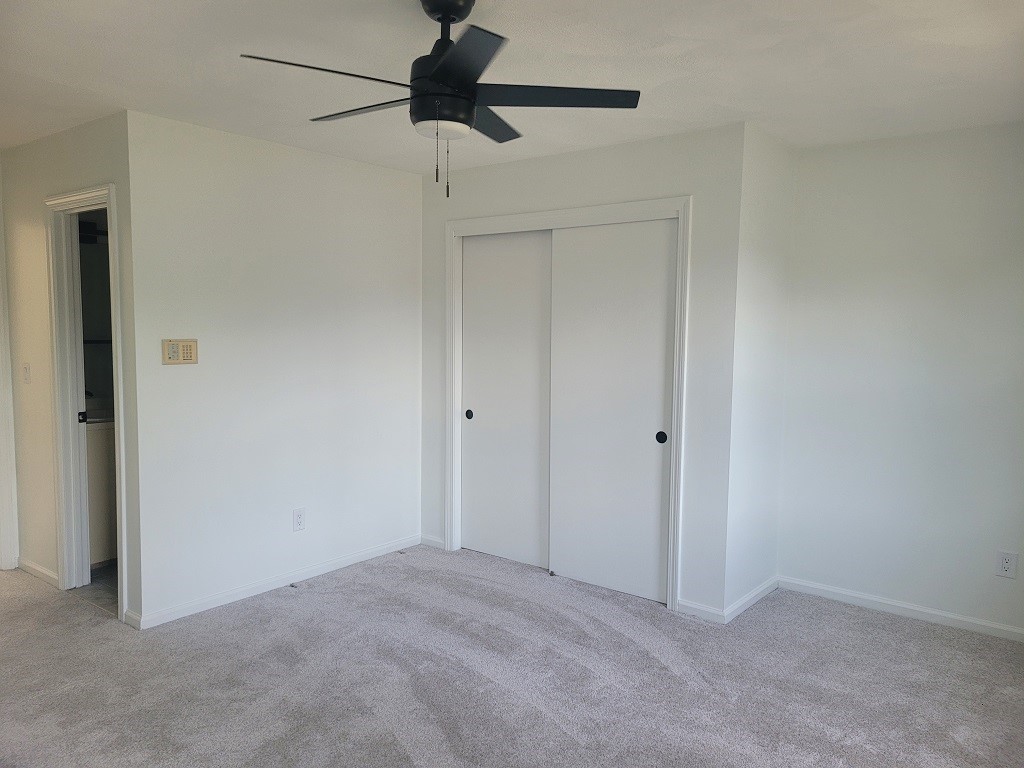 3399 Post Road, Unit 27 Warwick, RI 02886 - Photo 17 of 36 Newly carpeted master with lots of closet space