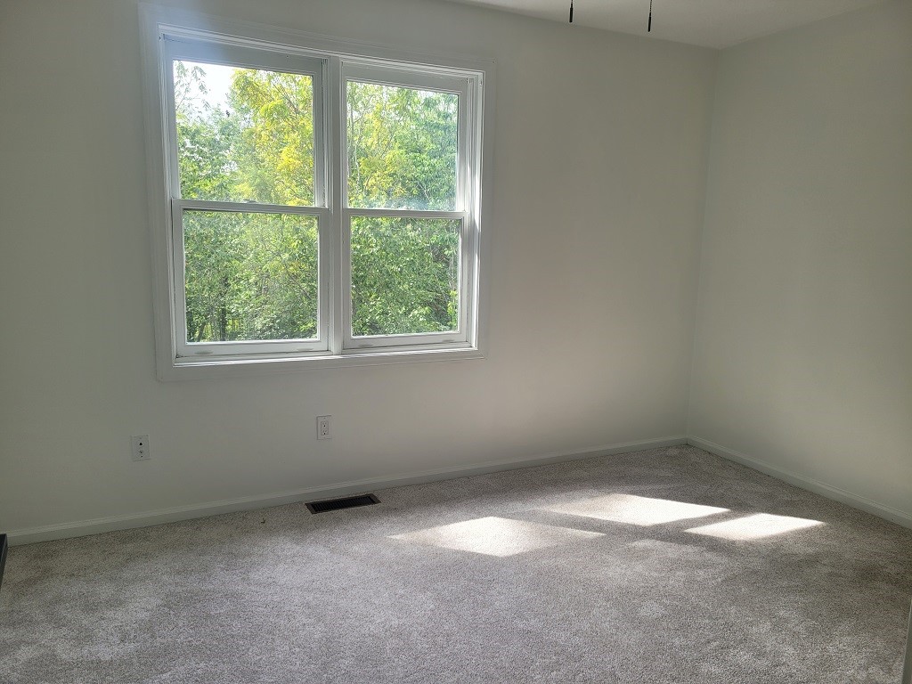 3399 Post Road, Unit 27 Warwick, RI 02886 - Photo 26 of 36 Spacious and filled with light