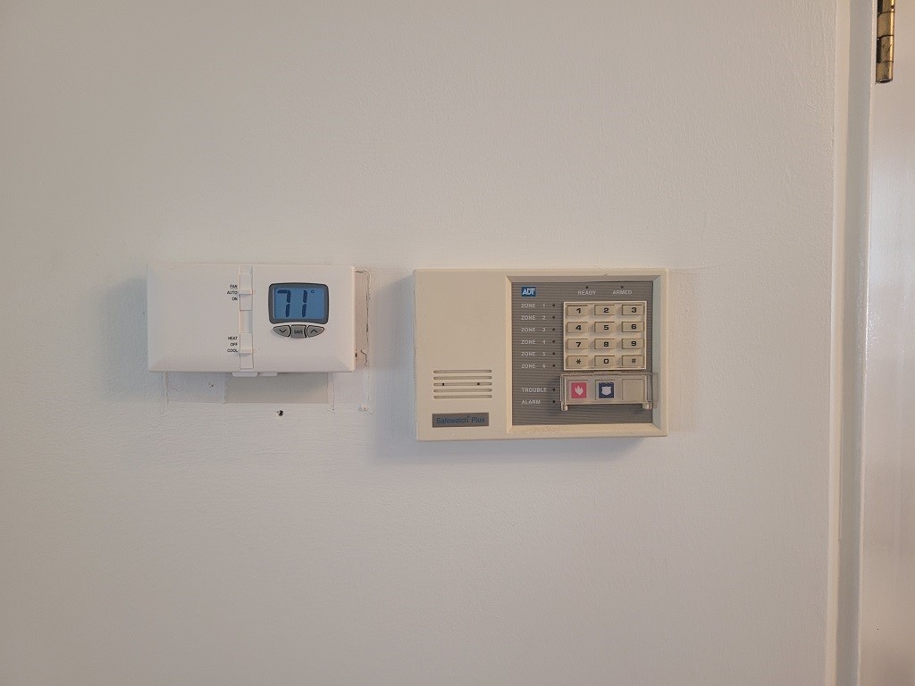 3399 Post Road, Unit 27 Warwick, RI 02886 - Photo 33 of 36 New thermostat