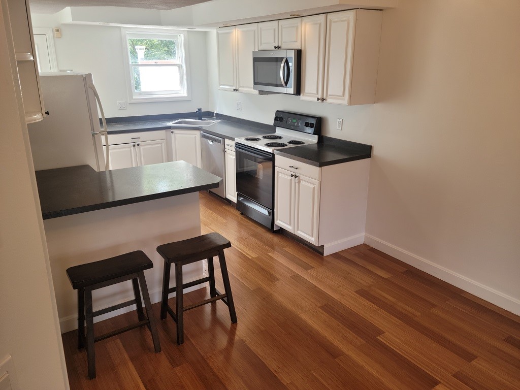 3399 Post Road, Unit 27 Warwick, RI 02886 - Photo 4 of 36 Light and bright open kitchen
