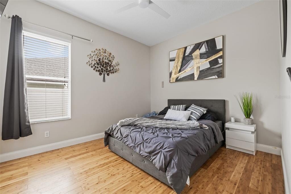 22623 Cliffside Way Land O' Lakes, FL 34639 - Photo 36 of 49 a bedroom with a bed and a window