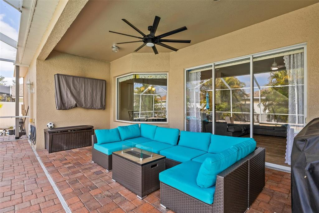 22623 Cliffside Way Land O' Lakes, FL 34639 - Photo 40 of 49 a living room with furniture and a large window