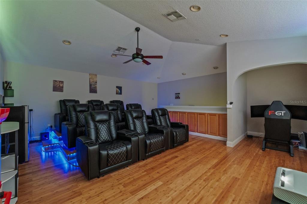 22623 Cliffside Way Land O' Lakes, FL 34639 - Photo 10 of 49 a living room with couch and wooden floor