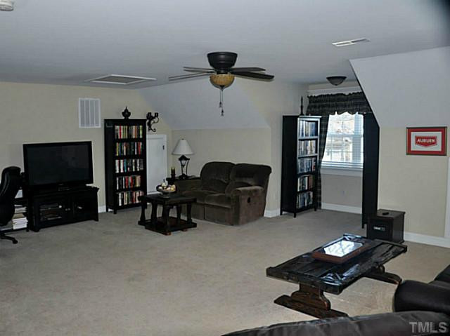 17 North Sunset Ridge Drive Willow Spring, NC 27592 - Photo 11 of 18 very spacious bonus room on the second level.