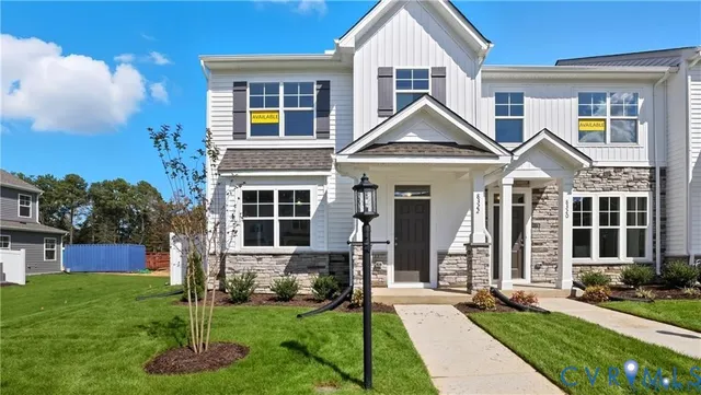 a view of a house with garden and yard