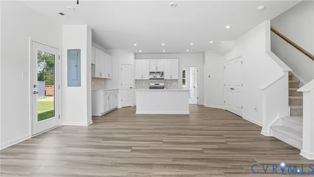 a view of kitchen with wooden floor