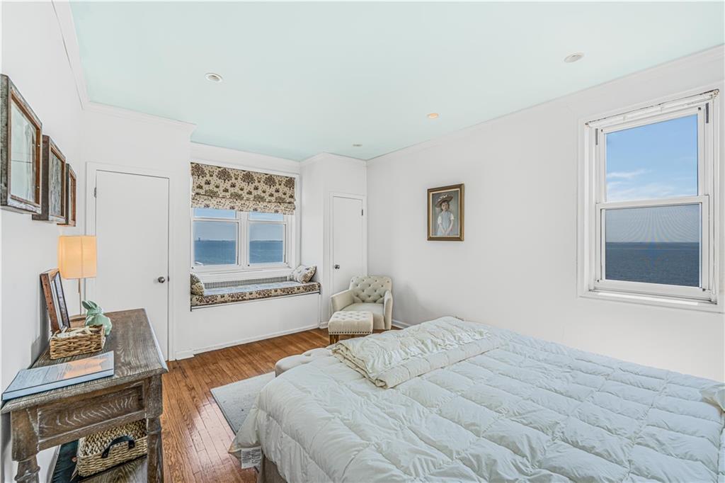 286 Corbin Place, Unit 5E Brooklyn, NY 11235 - Photo 13 of 35 a bedroom with furniture and a window