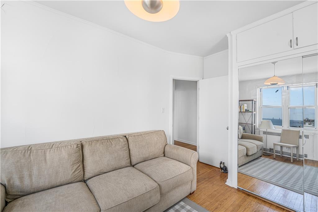 286 Corbin Place, Unit 5E Brooklyn, NY 11235 - Photo 25 of 35 a living room with furniture and a couch