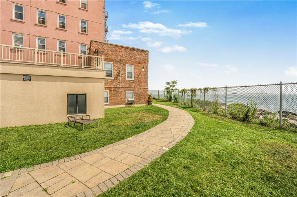 286 Corbin Place, Unit 5E Brooklyn, NY 11235 - Photo 34 of 35 a view of a house with a yard