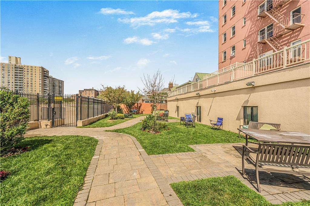 286 Corbin Place, Unit 5E Brooklyn, NY 11235 - Photo 35 of 35 a view of a patio with a yard