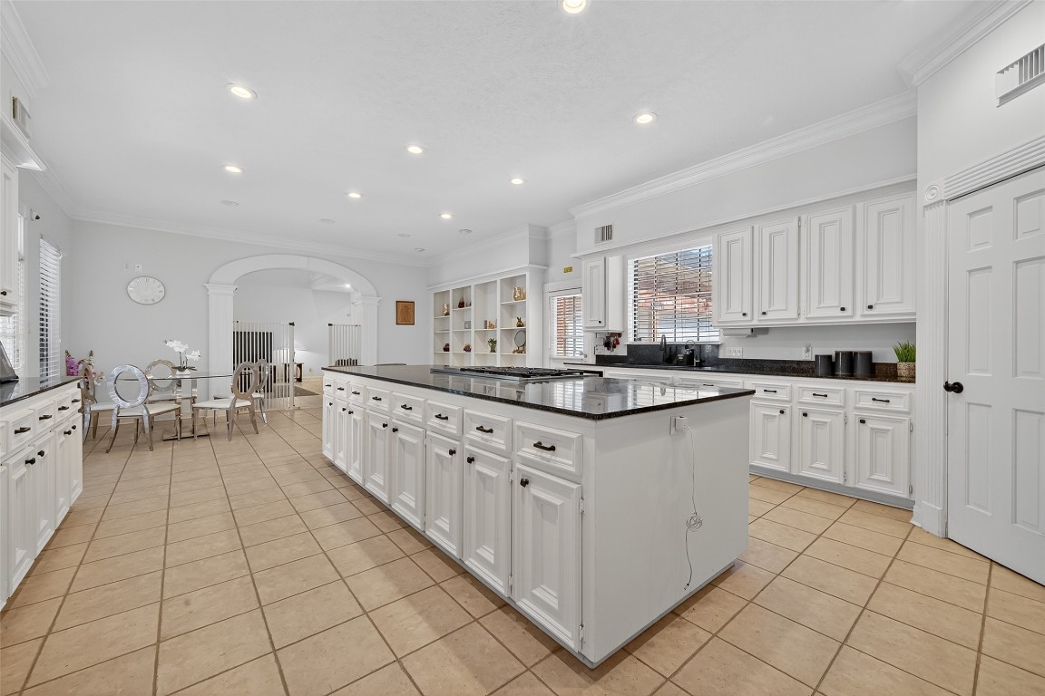 17318 Rothko Lane Spring, TX 77379 - Photo 14 of 46 a kitchen with stainless steel appliances granite countertop a sink and cabinets