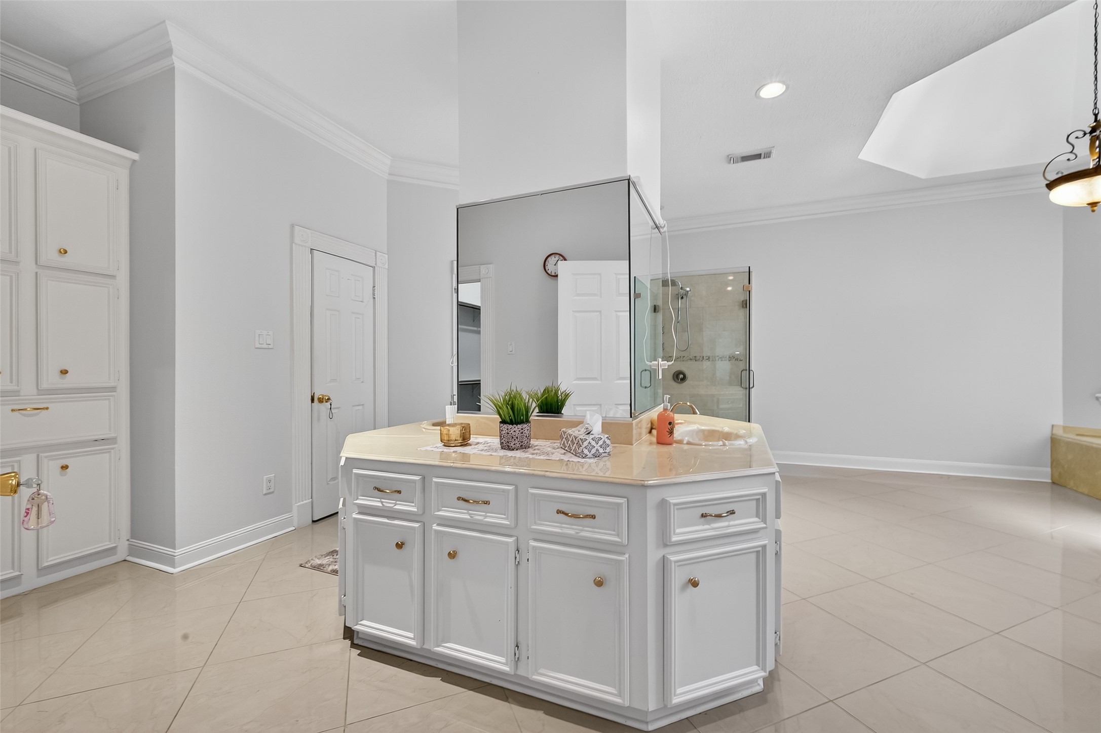 17318 Rothko Lane Spring, TX 77379 - Photo 20 of 46 a spacious bathroom with a double vanity sink and a mirror