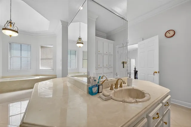 a bathroom with a sink and a bathtub