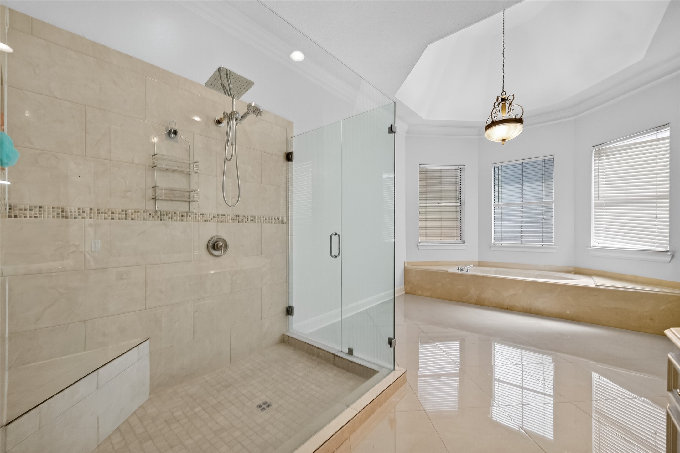 17318 Rothko Lane Spring, TX 77379 - Photo 22 of 46 a bathroom with a tub sink and mirror