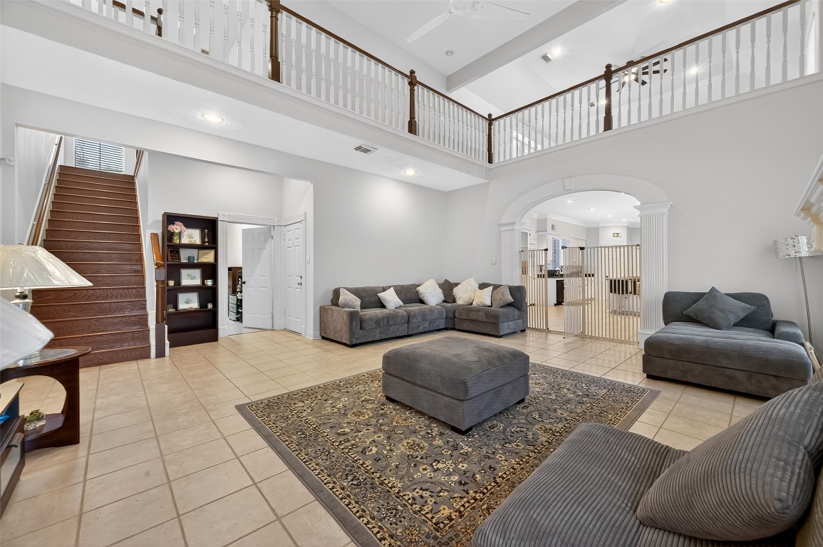 17318 Rothko Lane Spring, TX 77379 - Photo 26 of 46 a living room with furniture and a large window