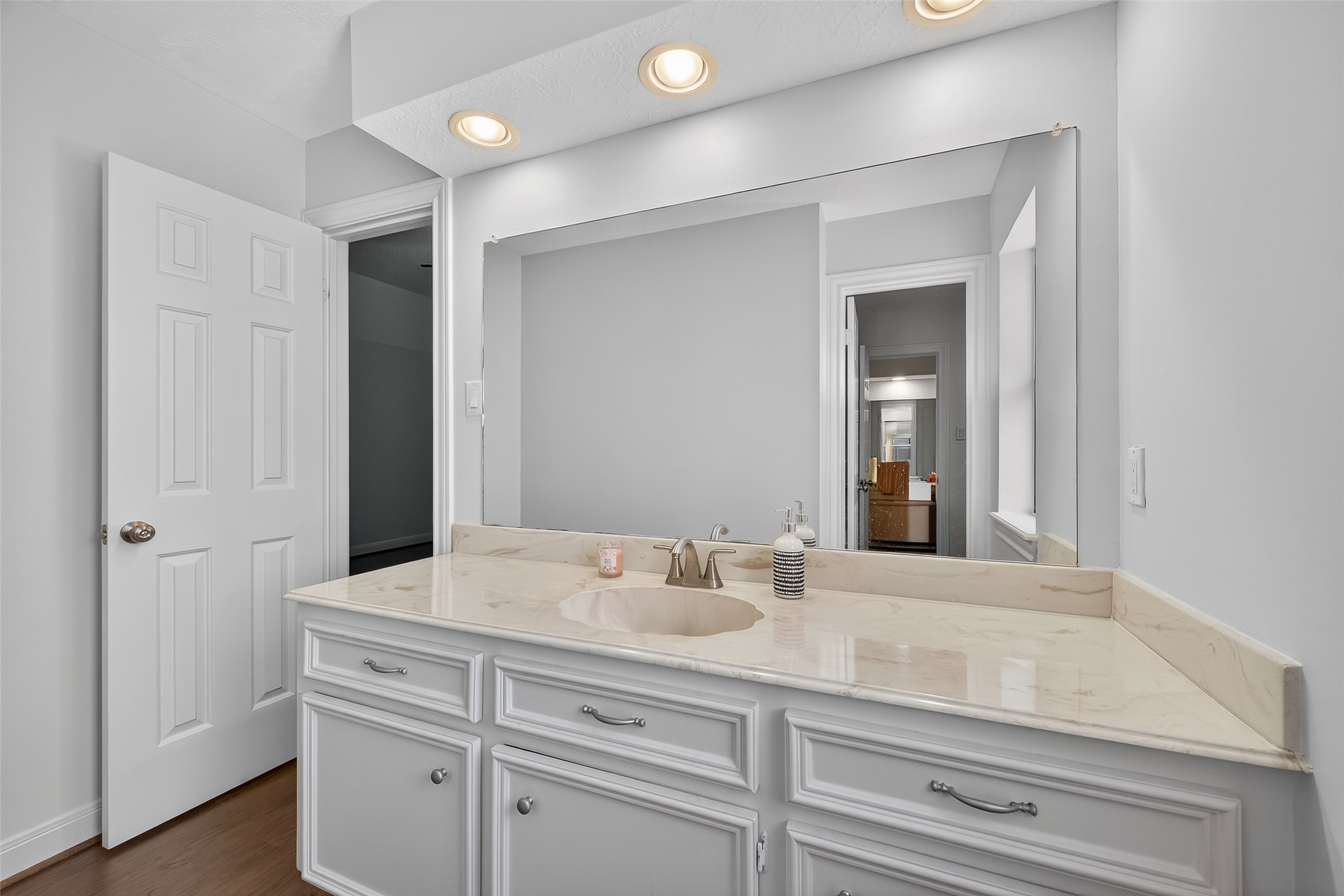 17318 Rothko Lane Spring, TX 77379 - Photo 38 of 46 a bathroom with a sink vanity and mirror