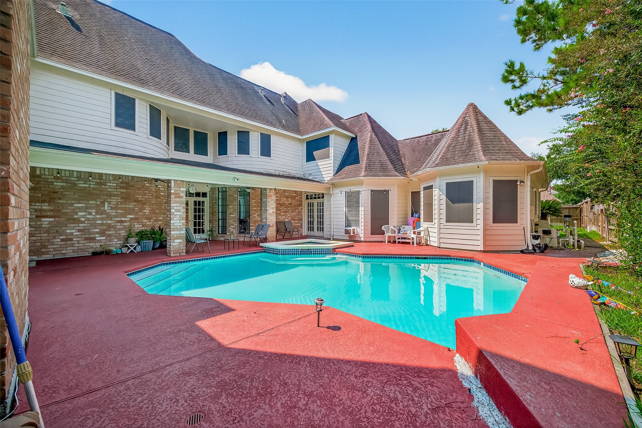 17318 Rothko Lane Spring, TX 77379 - Photo 46 of 46 a view of a house with a yard patio and a small yard