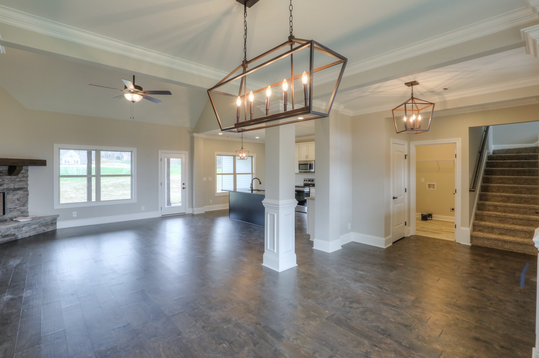 2365 Belotes Ferry Road Lebanon, TN 37087 - Photo 13 of 35 a view of an empty room with wooden floor and a ceiling fan