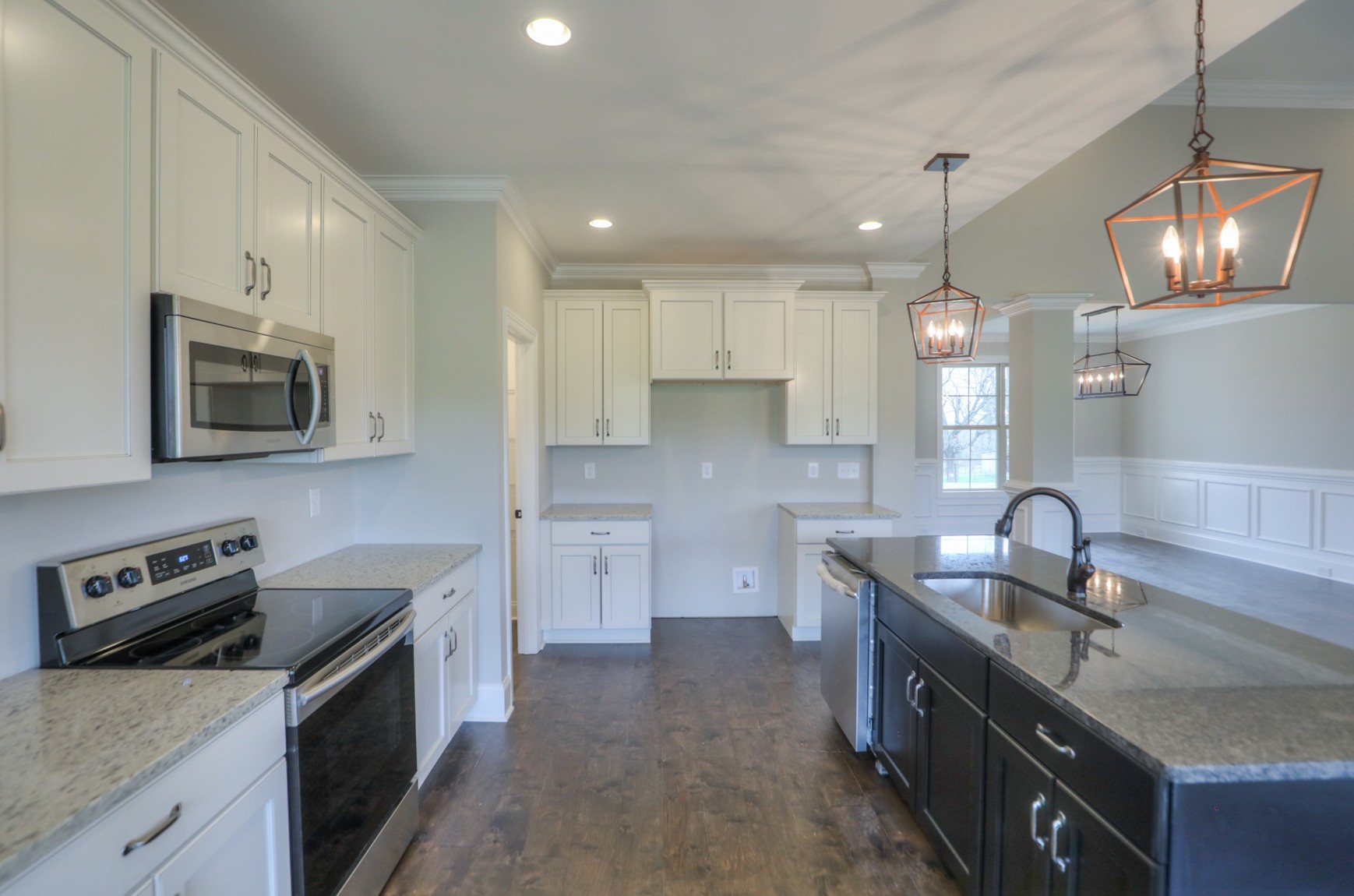 2365 Belotes Ferry Road Lebanon, TN 37087 - Photo 19 of 35 a kitchen with stainless steel appliances granite countertop a sink stove and refrigerator