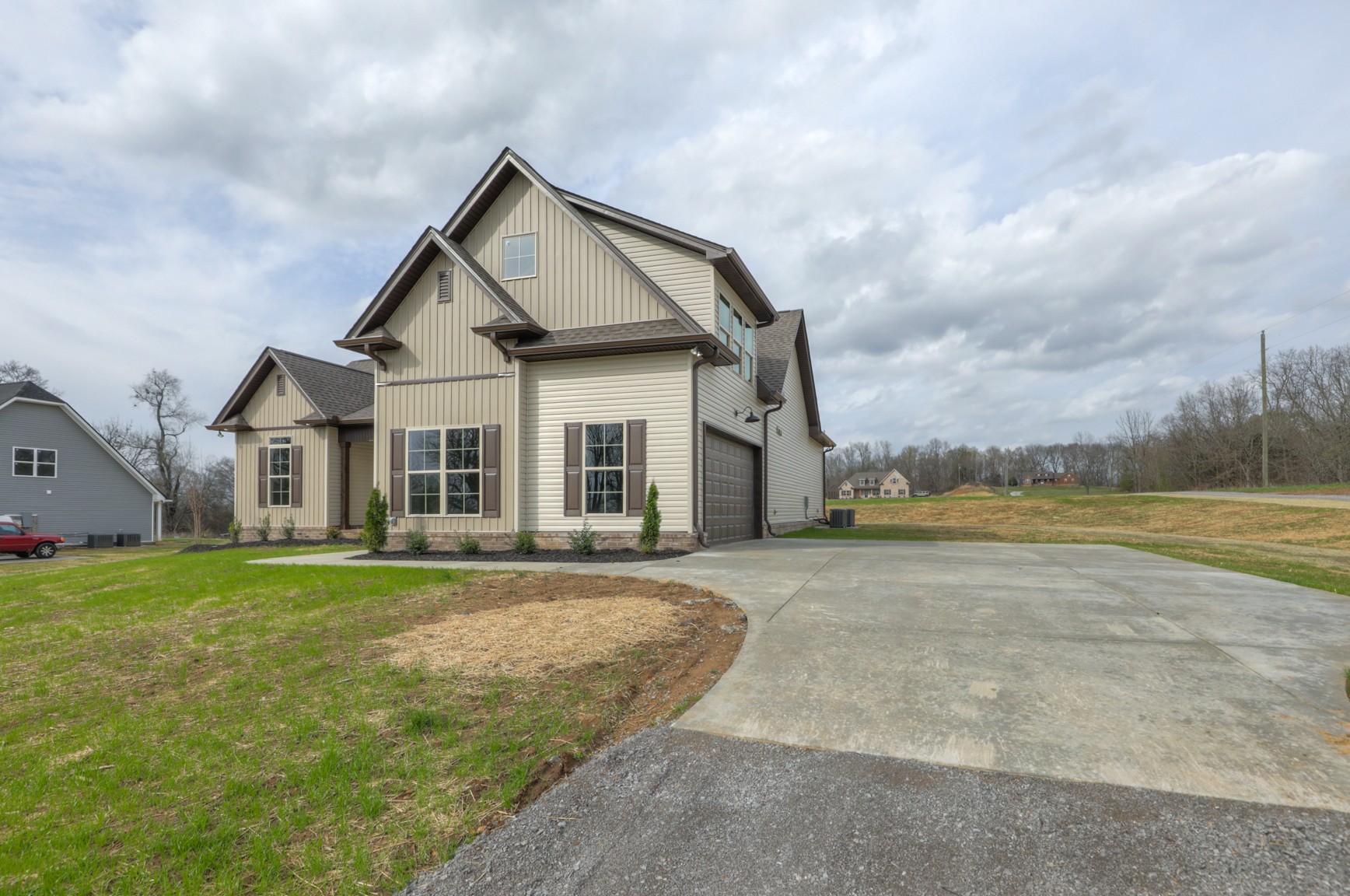 2365 Belotes Ferry Road Lebanon, TN 37087 - Photo 4 of 35 a view of a house with a big yard and large trees