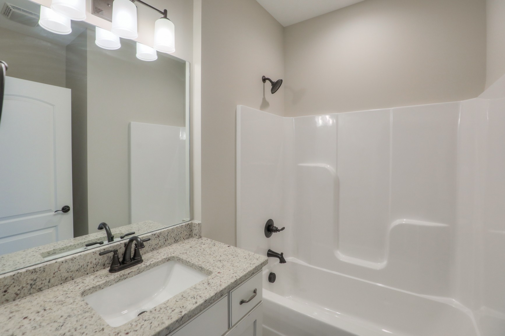2365 Belotes Ferry Road Lebanon, TN 37087 - Photo 31 of 35 a bathroom with a granite countertop sink a toilet and shower