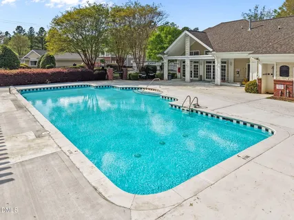 a view of a house with a swimming pool