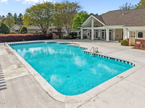 a view of a house with a swimming pool