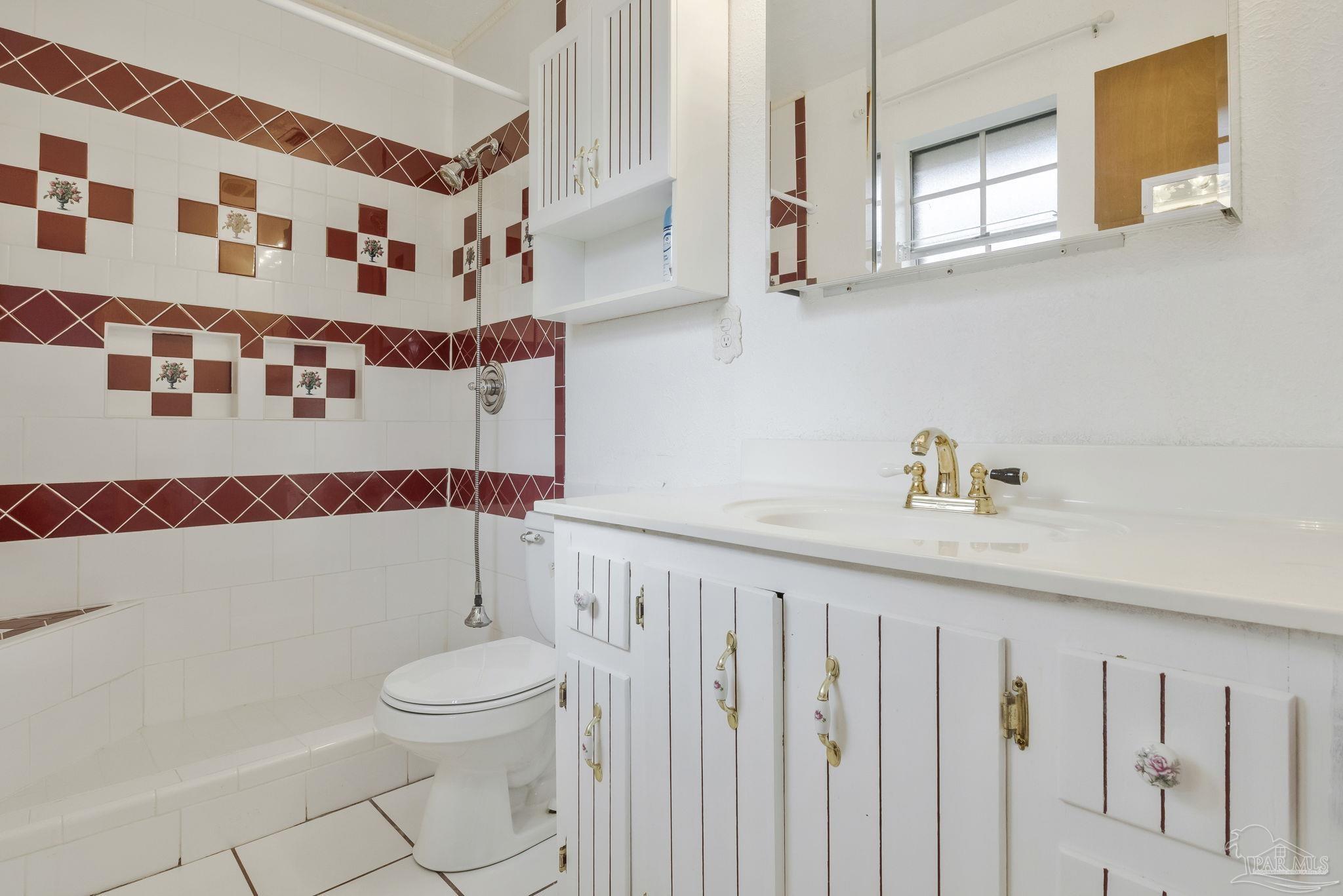 4411 Pace Lane Pace, FL 32571 - Photo 54 of 68 a bathroom with a bathtub and a shower