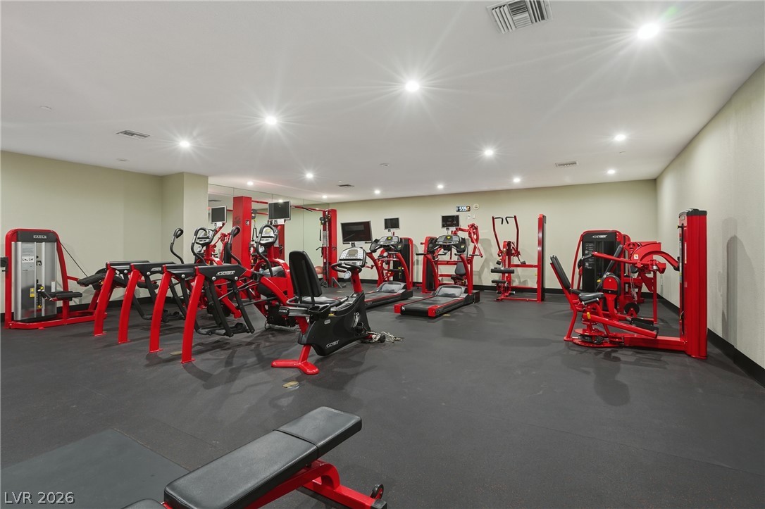360 East Desert Inn Road, Unit 1701 Las Vegas, NV 89109 - Photo 31 of 33 Equipped with state-of-the-art machinery, this fitness center promotes a dynamic workout environment.