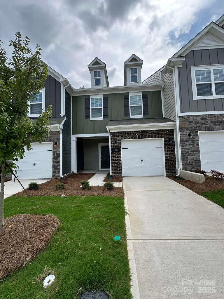 3512 Nimbell Road Monroe, NC 28110 - Photo 2 of 18 a front view of a house with a yard and garage