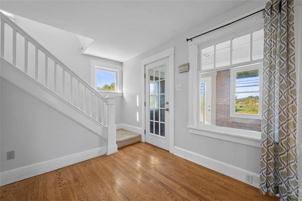 464 Franklin Street Slippery Rock, PA 16057 - Photo 11 of 45 a view of an entryway with wooden floor and windows